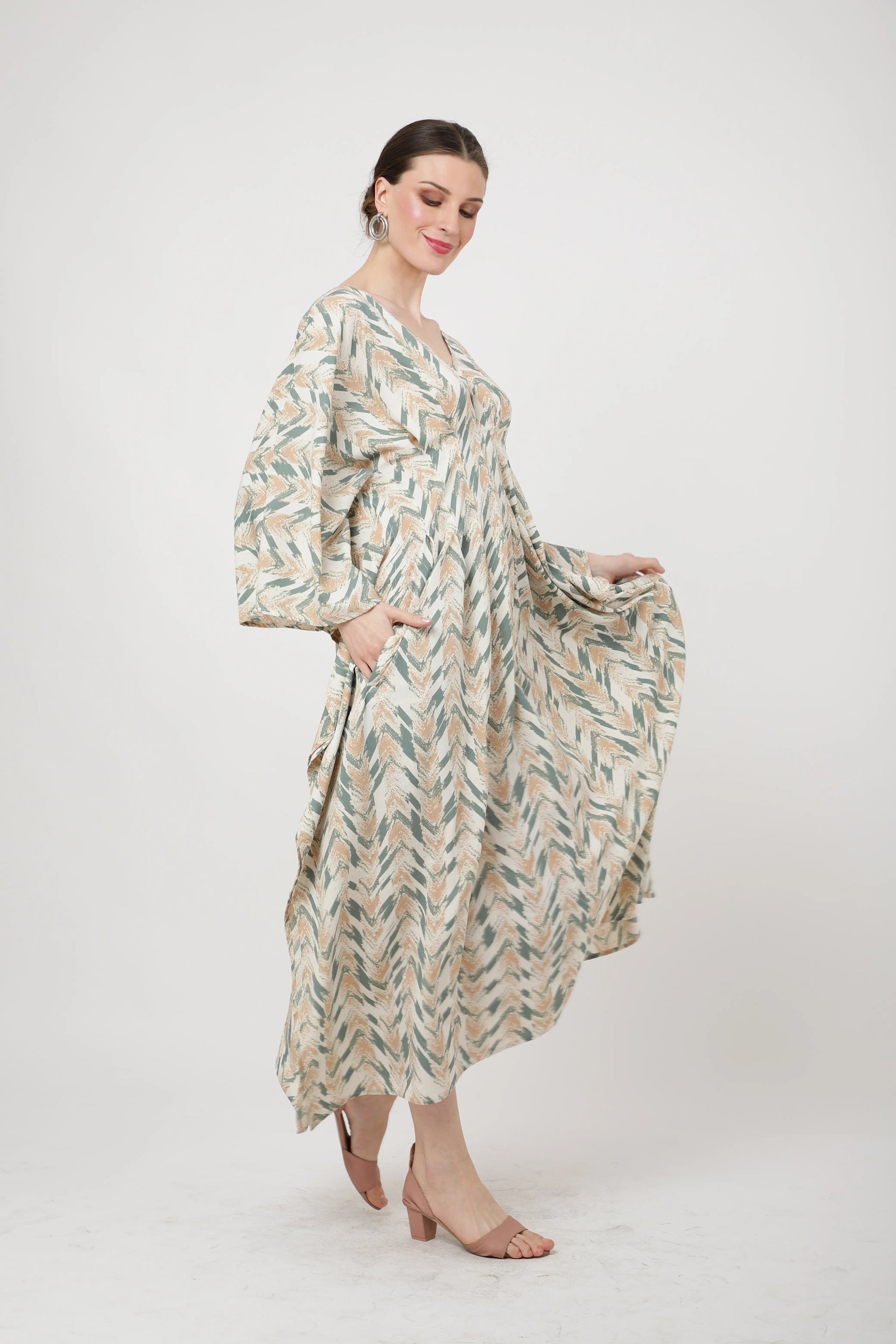 v-shaped-neckline-with-pleating-detail-at-the-waist-kaftan-dresses-165-cantaloupe-s-to-3xl
